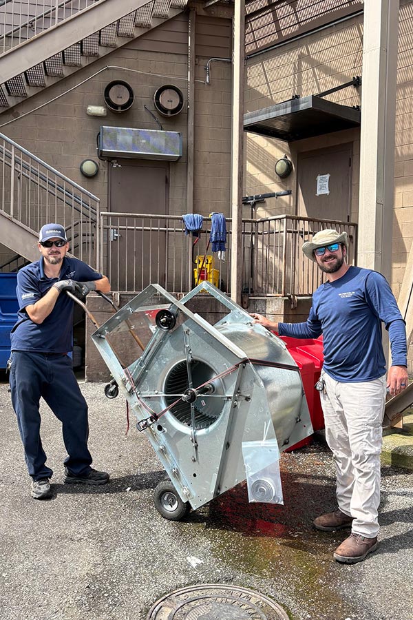 W.C. Wright and Son Teammates with fan